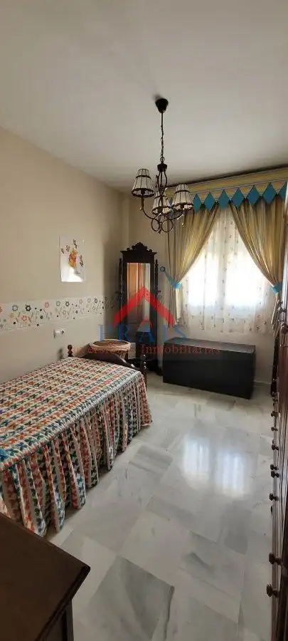 Habitación de Casa adosada en venta en Utrera con Aire acondicionado, Trastero y Amueblado