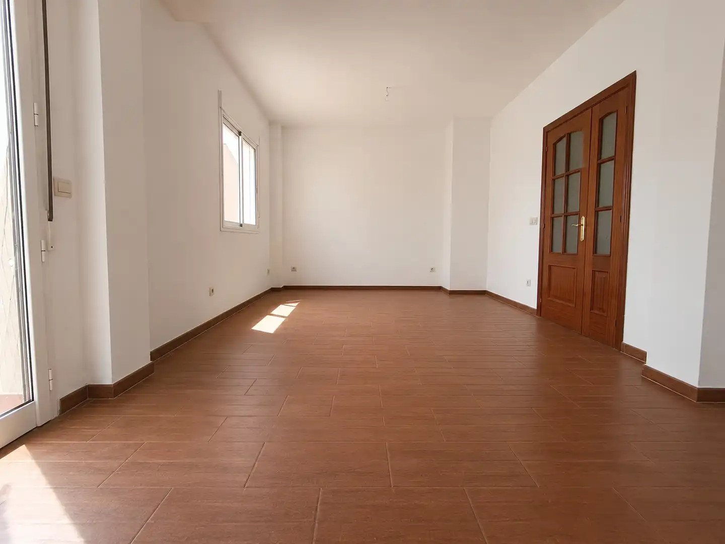 Sala de estar de Casa adosada en venta en La Carlota con Terraza, Horno y Lavadora