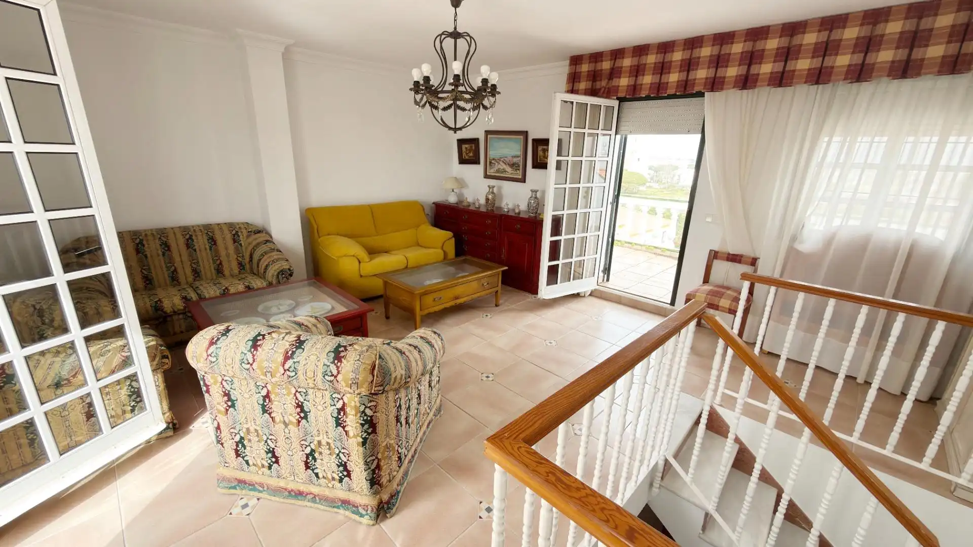 Sala de estar de Casa adosada de alquiler en Punta Umbría con Terraza y Piscina comunitaria
