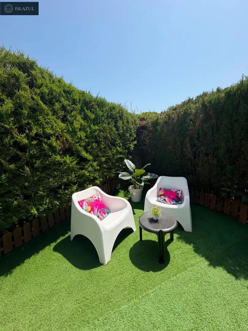 Terrasse von Einfamilien-Reihenhaus zum Verkauf in Islantilla mit Privatgarten, Terrasse und Abstellraum