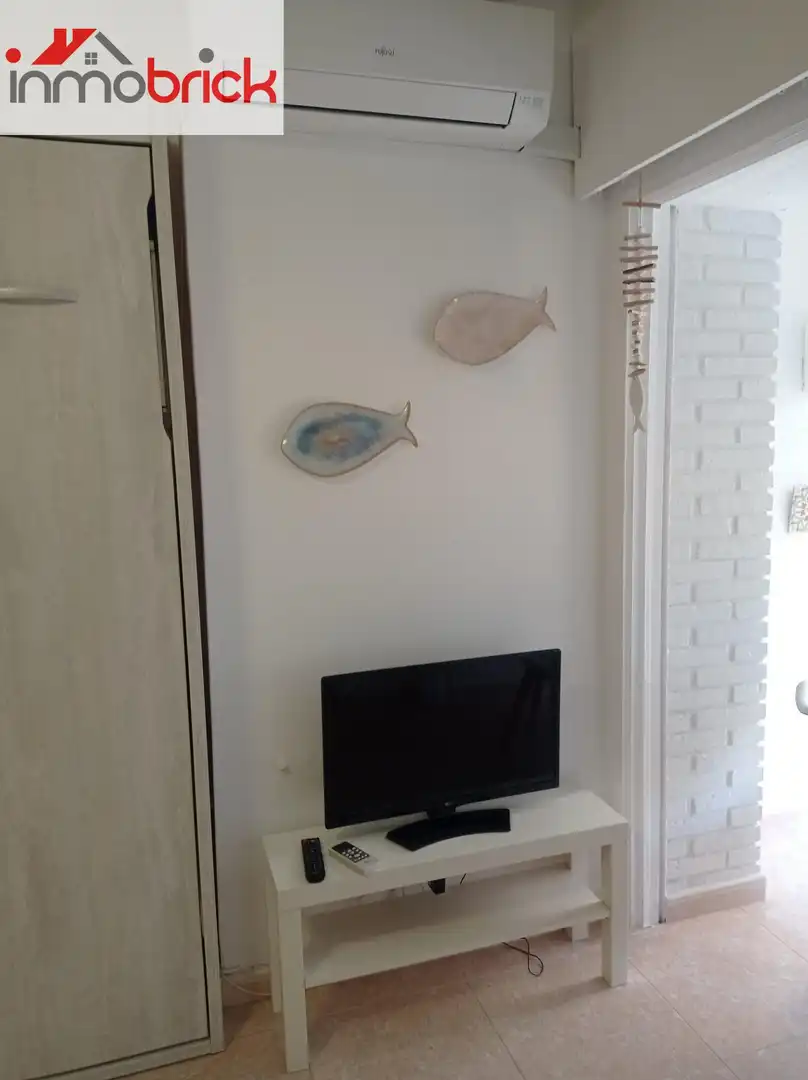 Sala de estar de Piso de alquiler en Benalmádena con Piscina comunitaria