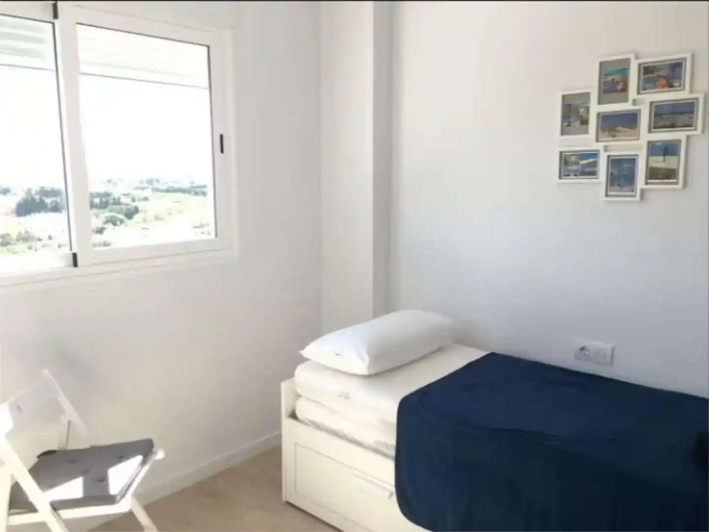 Dormitori de Pis de lloguer en Oliva amb Aire condicionat, Piscina i Moblat