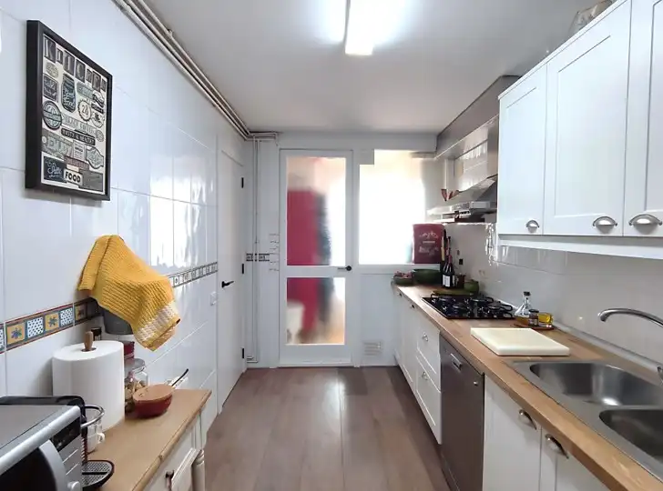 Küche von Dachboden zum Verkauf in Sant Andreu de Llavaneres mit Klimaanlage, Heizung und Parkett