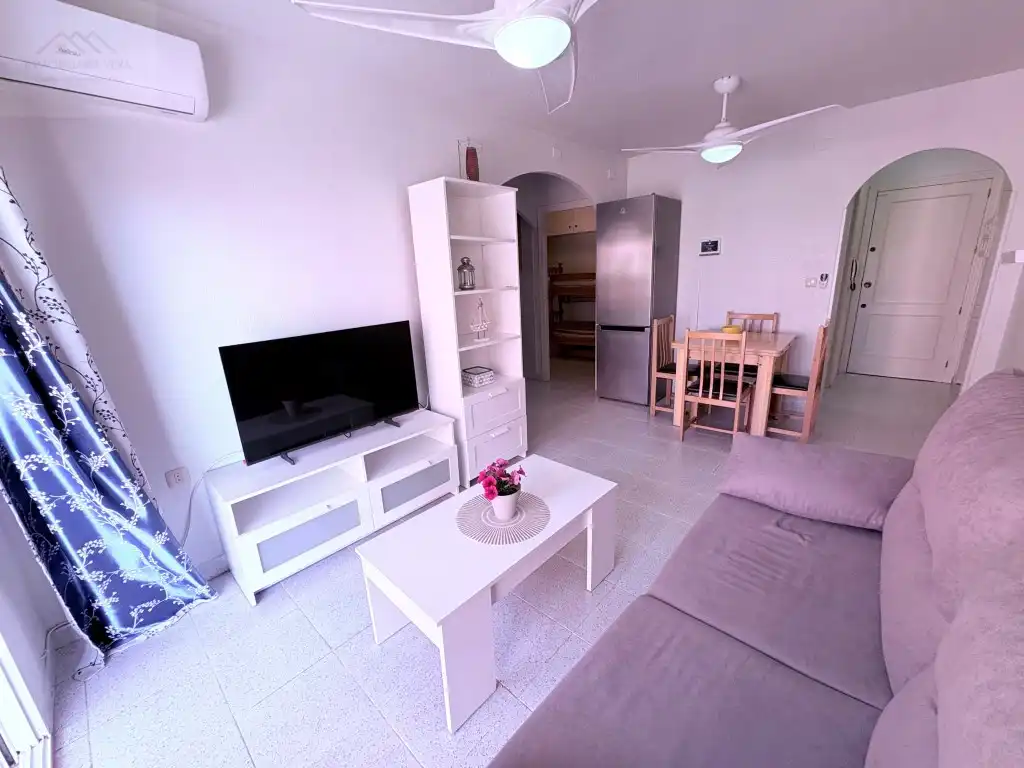 Sala d'estar de Apartament en venda en Mazarrón amb Aire condicionat, Moblat i Piscina comunitària