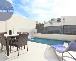 Swimming pool of Single-family semi-detached for sale in Águilas  with Air Conditioner, Heating and Private garden