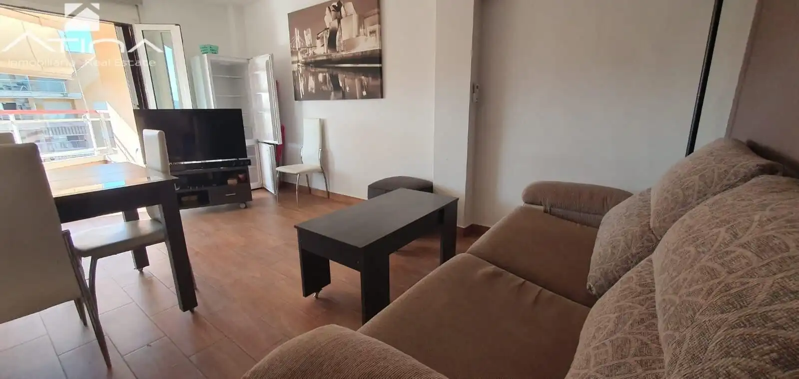 Sala d'estar de Apartament en venda en Guardamar de la Safor amb Aire condicionat, Terrassa i Piscina comunitària