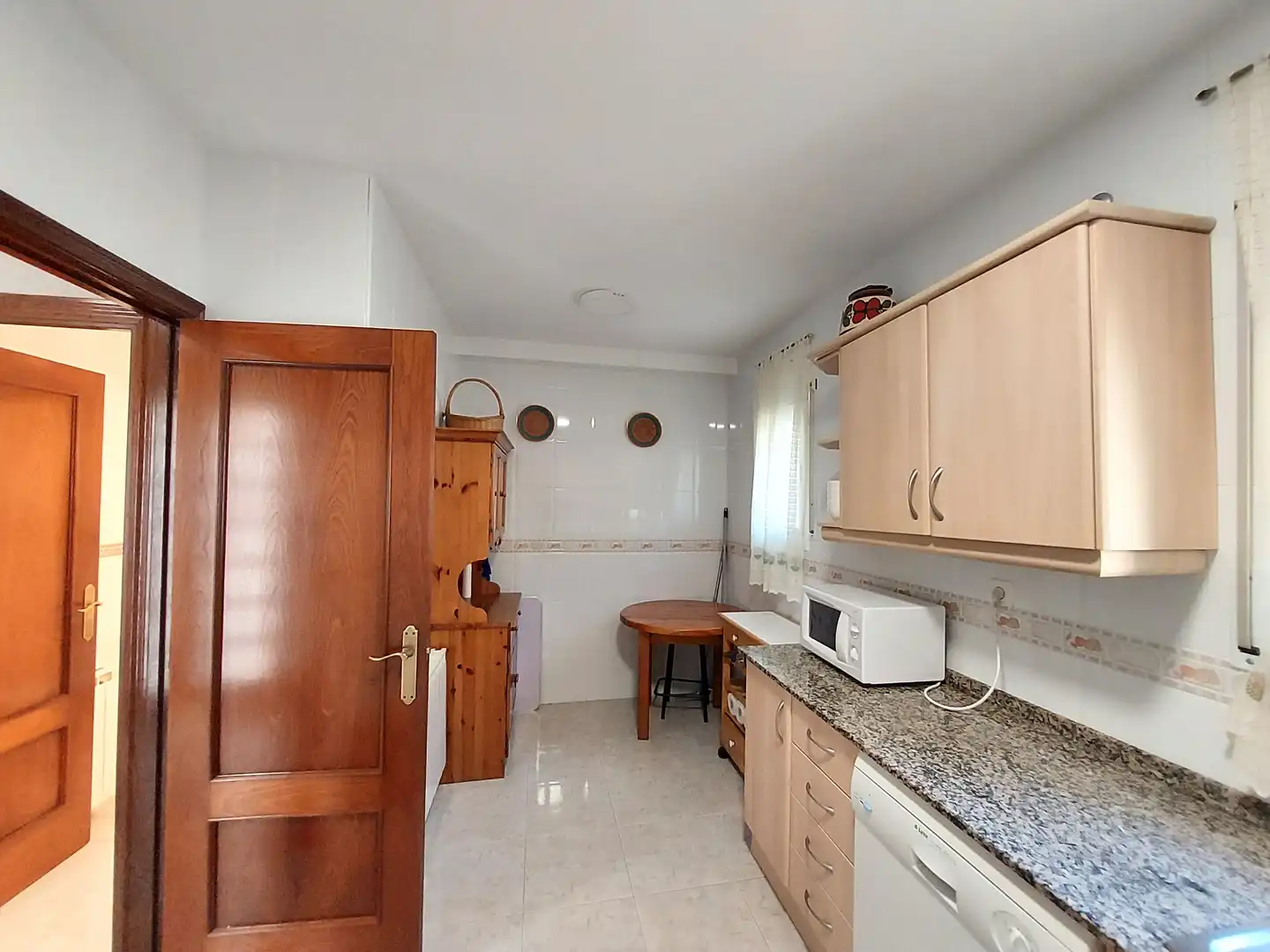 Cocina de Casa adosada en venta en El Vendrell con Jardín privado, Terraza y Piscina