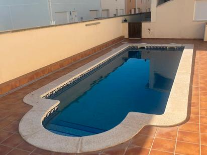 Swimming pool of Single-family semi-detached for sale in Sant Jaume d'Enveja  with Heating, Terrace and Community pool