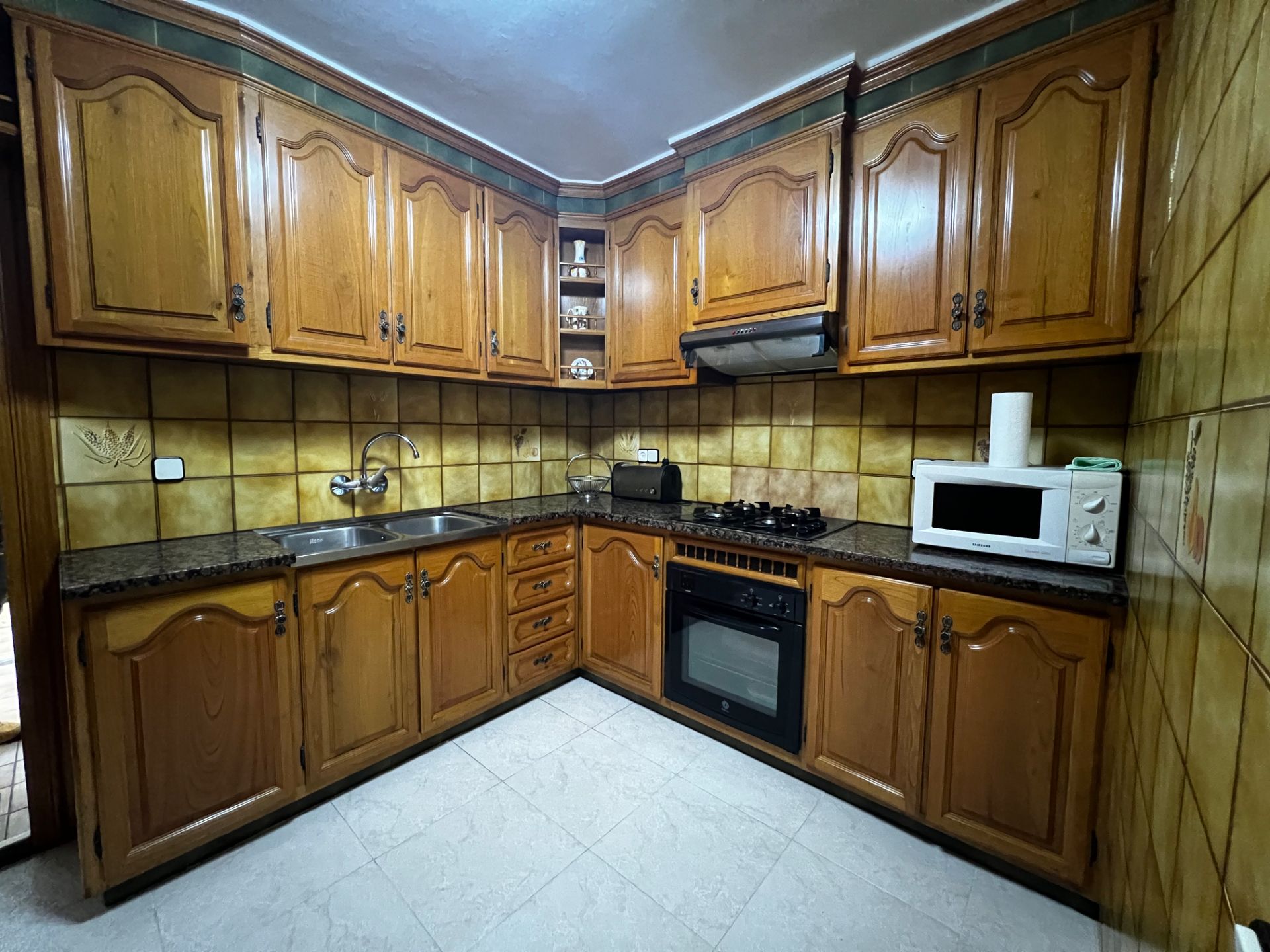 Kitchen of Planta baja for sale in Canet de Mar  with Air Conditioner, Heating and Oven