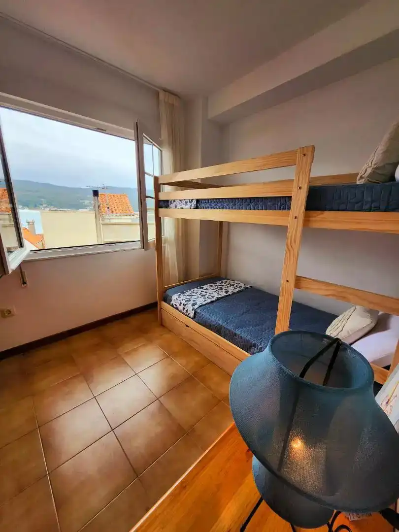 Schlafzimmer von Wohnung zur Miete in Laxe