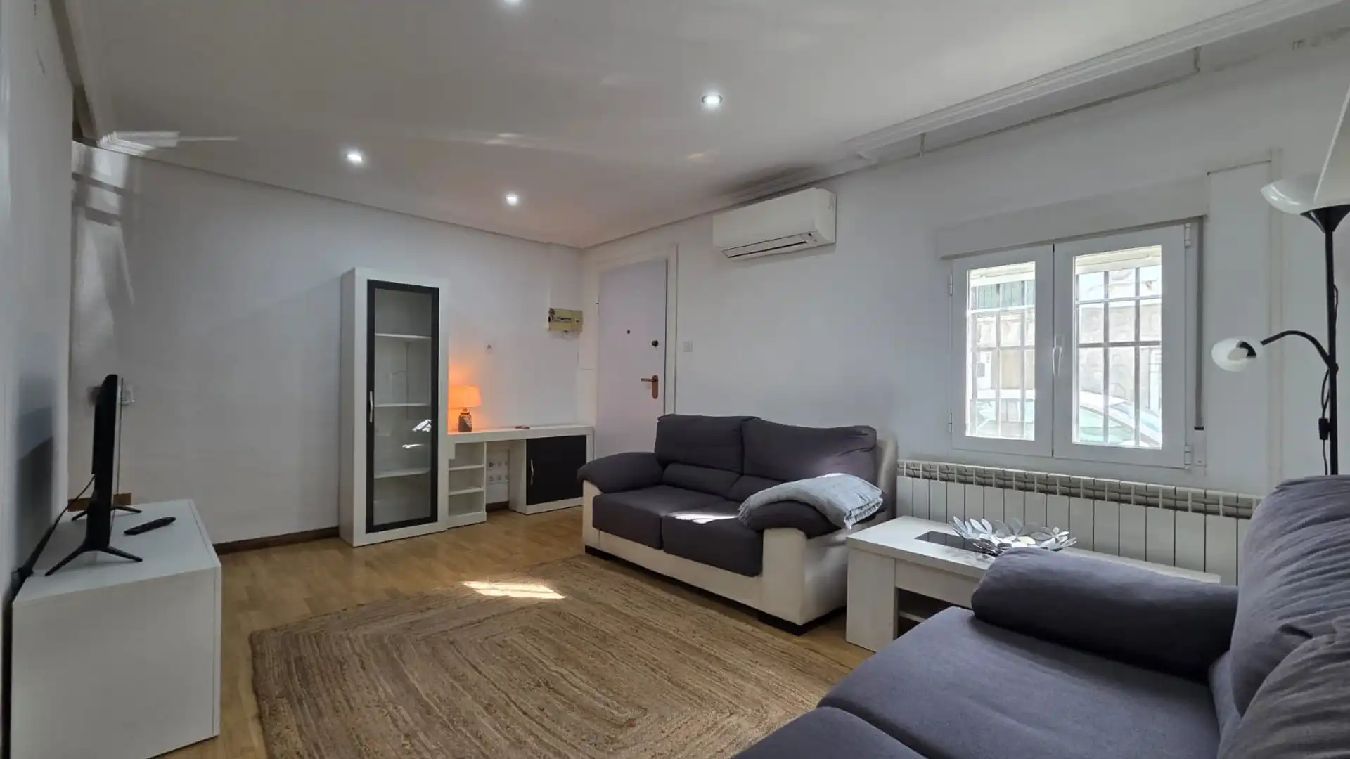 Sala de estar de Casa adosada en venta en Las Rozas de Madrid con Aire acondicionado, Calefacción y Trastero