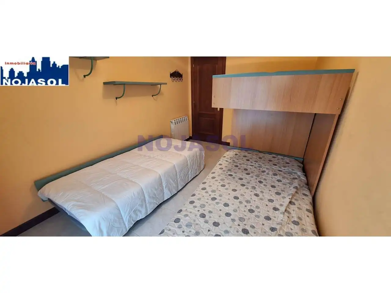 Dormitori de Apartament de lloguer en Noja amb Calefacció, Jardí privat i Terrassa