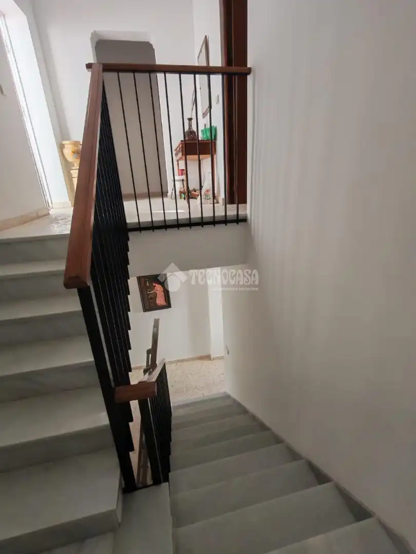 Casa adosada en venda en Marchena amb Aire condicionat