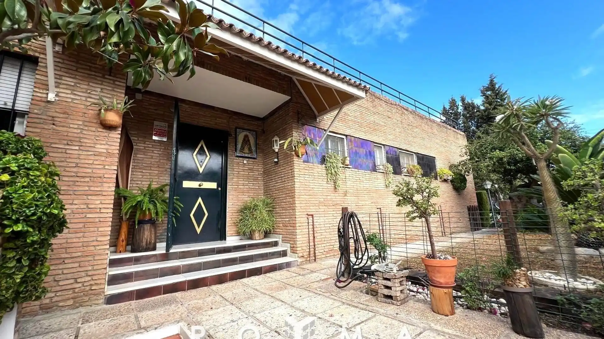 Vista exterior de Casa o chalet en venta en Alcalá de Guadaira con Aire acondicionado, Jardín privado y Terraza