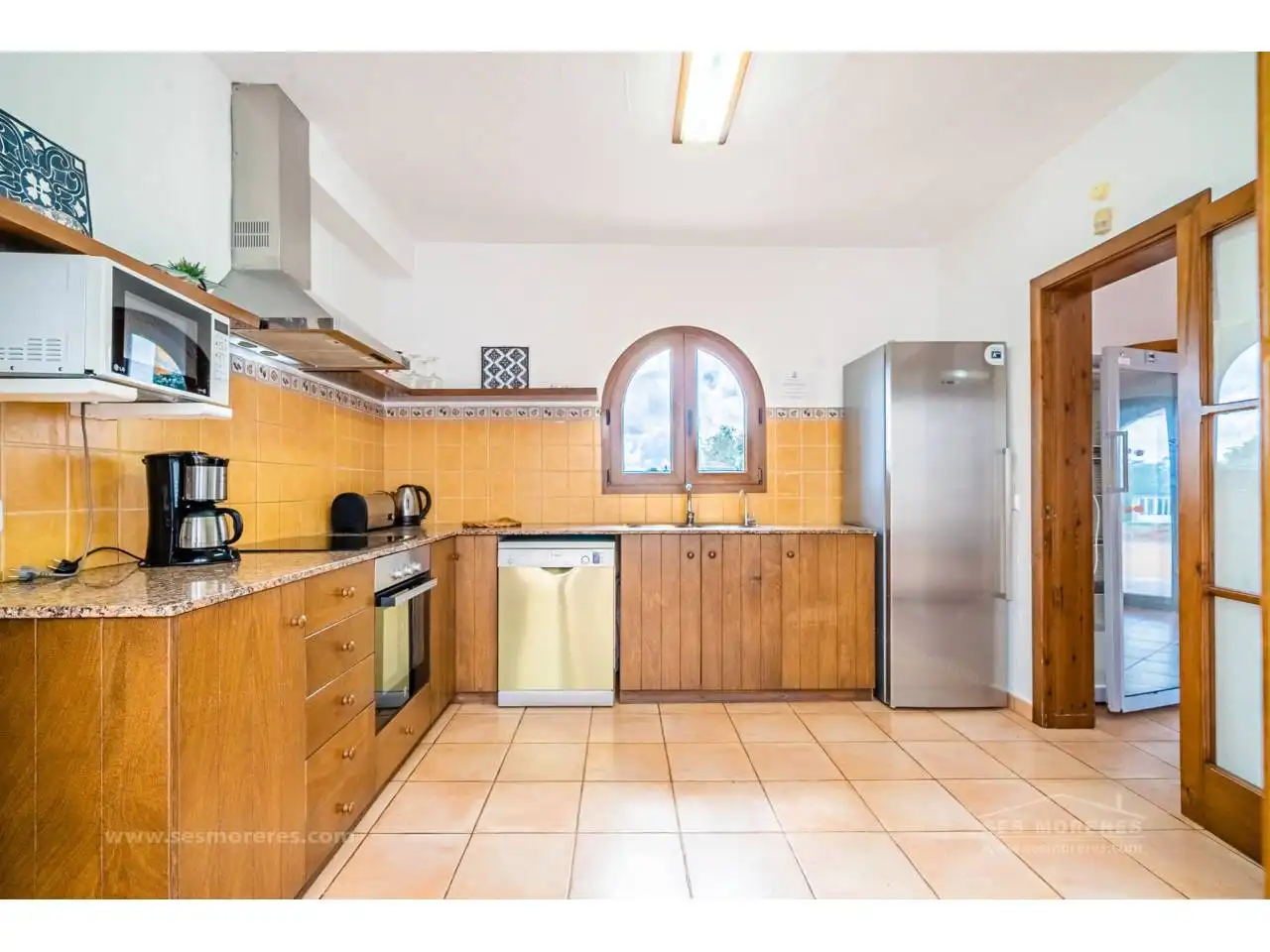 Cocina de Finca rústica en venta en Ferreries con Aire acondicionado, Jardín privado y Terraza