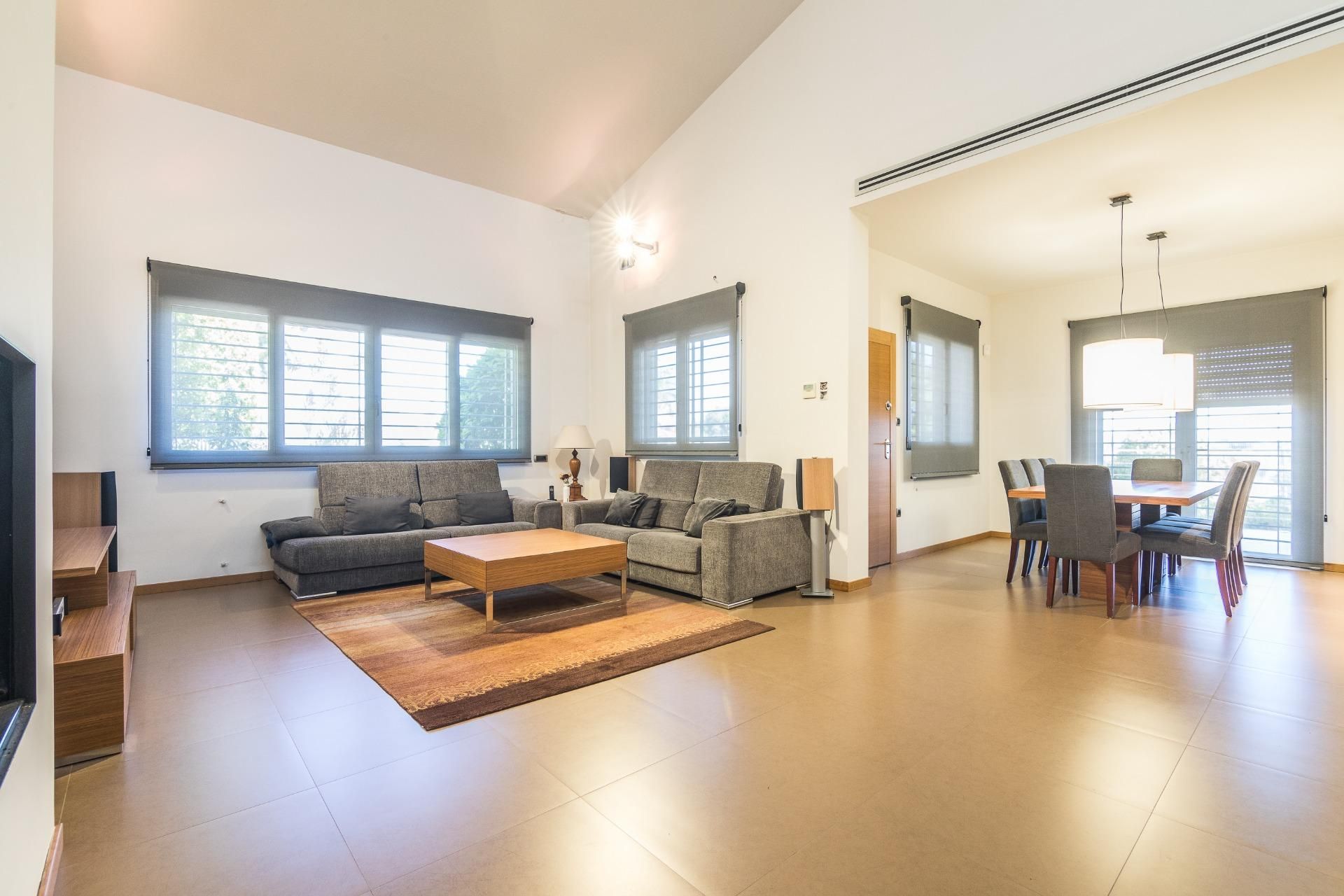 Sala d'estar de Casa o xalet en venda en Elche / Elx amb Aire condicionat, Jardí privat i Terrassa