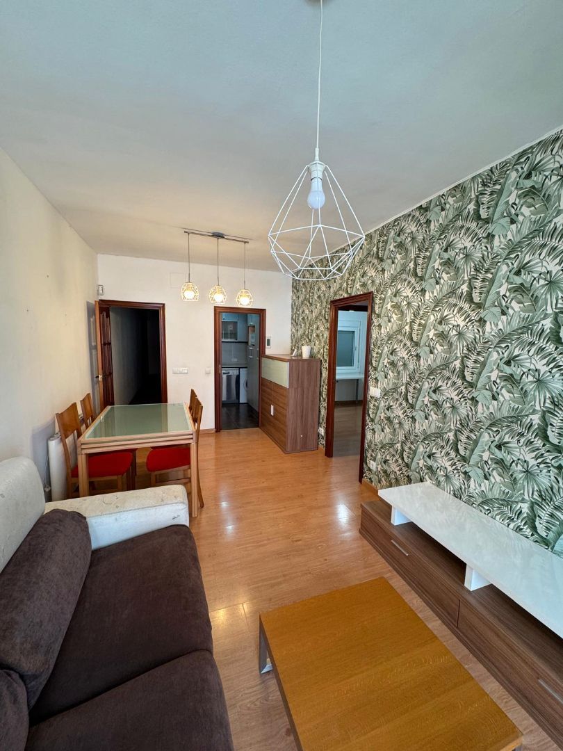 Living room of Flat for sale in Badalona  with Heating, Parquet flooring and Furnished