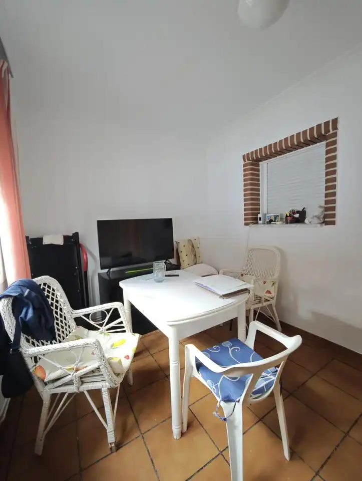 Sala de estar de Casa adosada en venta en El Álamo con Aire acondicionado, Calefacción y Jardín privado