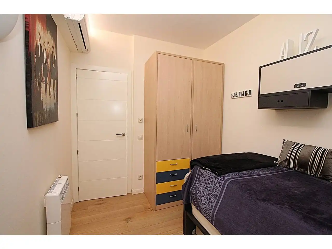 Schlafzimmer von Wohnung zum Verkauf in Lloret de Mar mit Klimaanlage, Heizung und Privatgarten