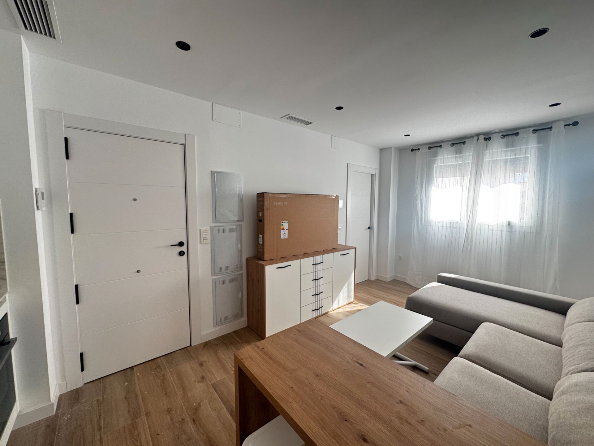 Sala d'estar de Apartament de lloguer en Maracena amb Aire condicionat, Parquet i Moblat