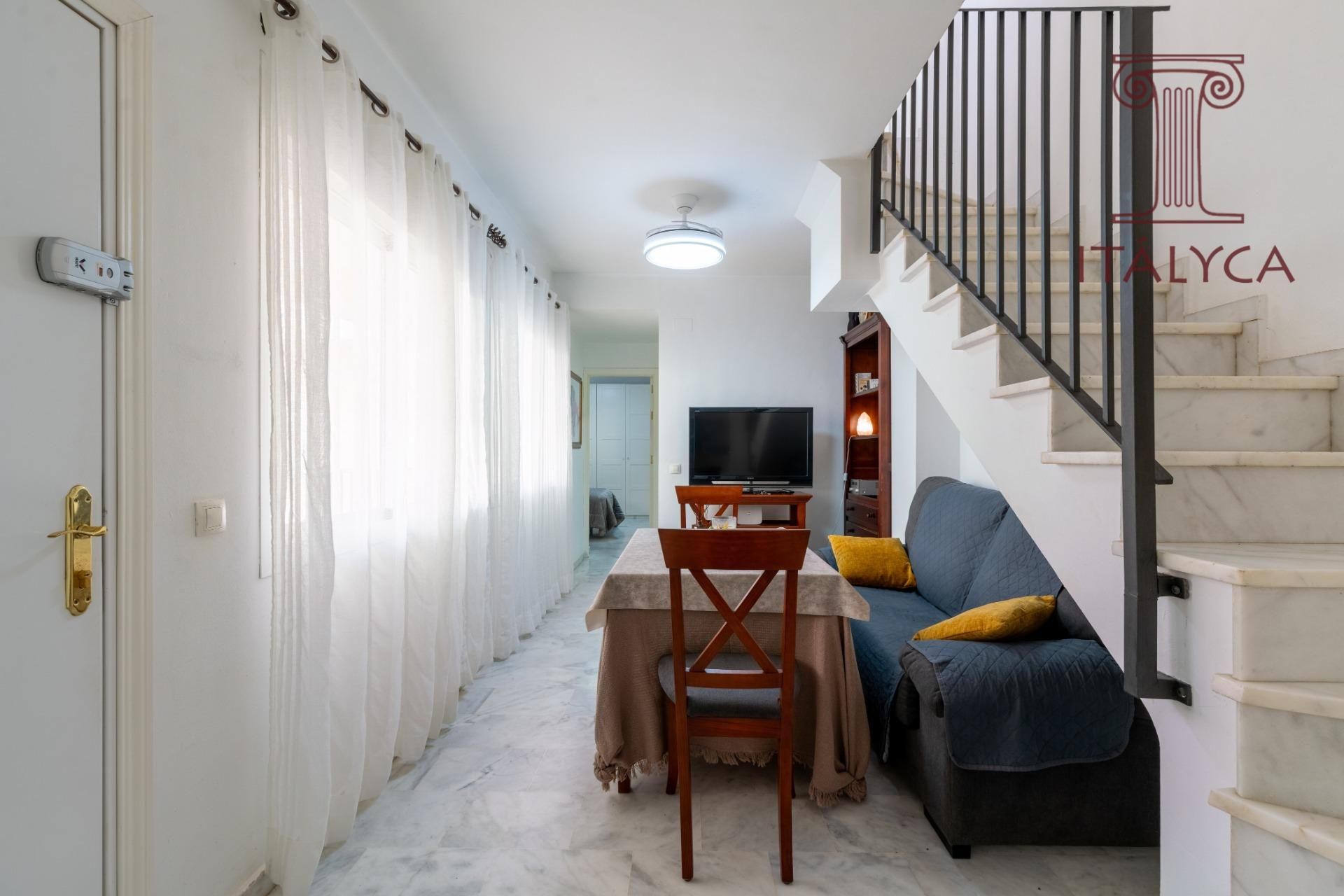 Living room of Duplex for sale in Sanlúcar la Mayor  with Air Conditioner, Terrace and Storage room