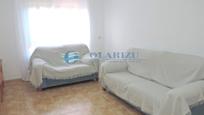 Living room of Flat for sale in Roquetas de Mar