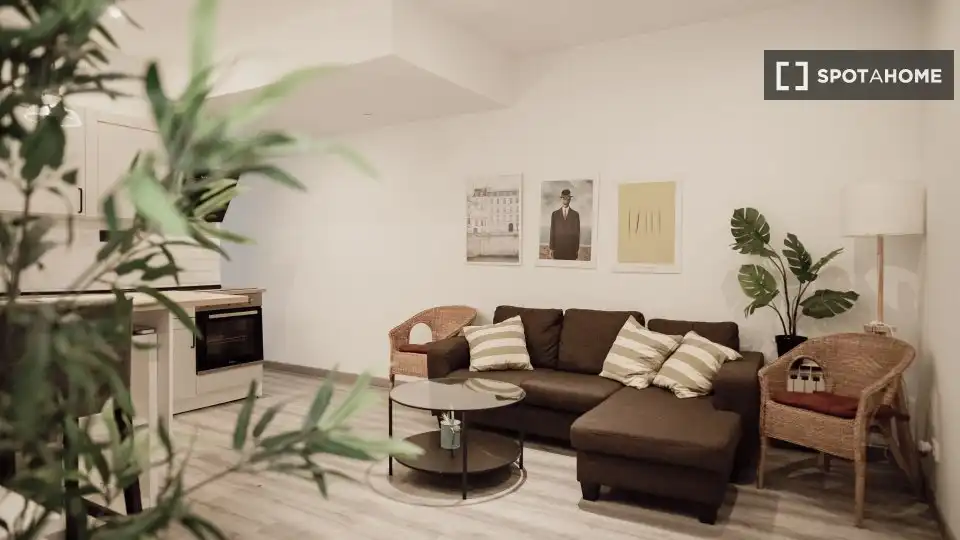 Sala de estar de Piso para compartir en Barcelona con Aire acondicionado, Calefacción y Amueblado