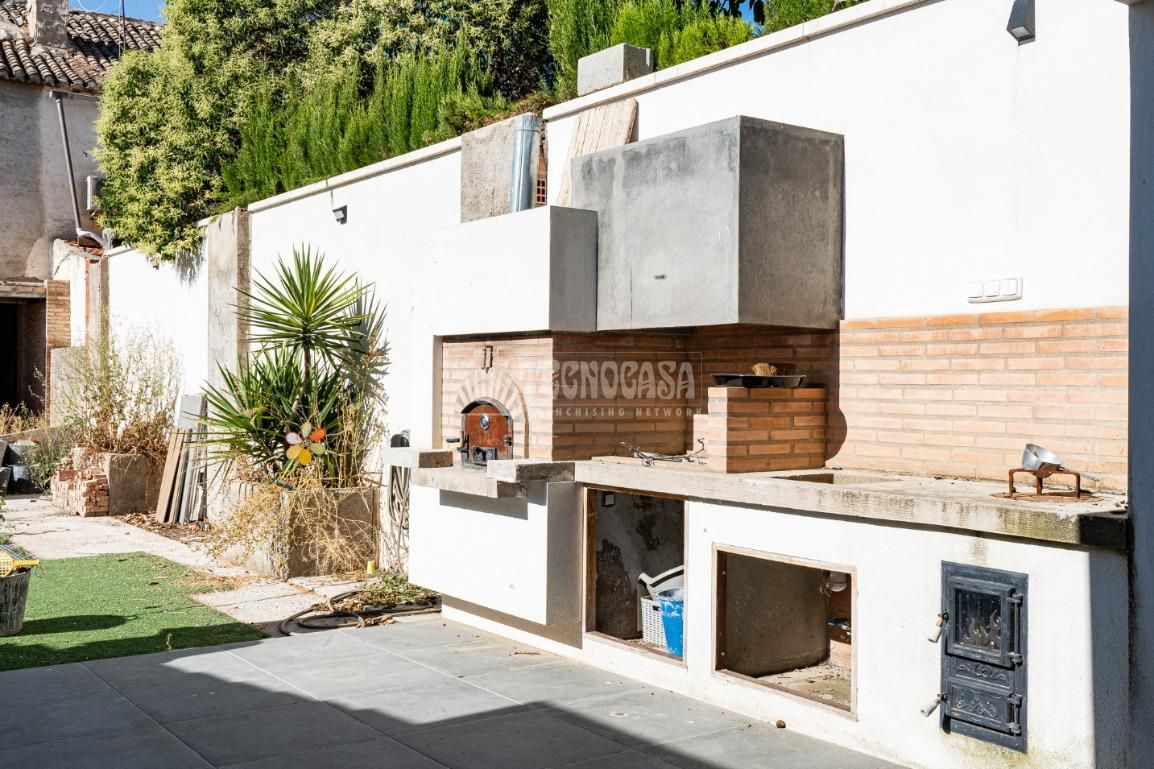 Exterior view of Single-family semi-detached for sale in Vegas del Genil  with Air Conditioner, Heating and Private garden