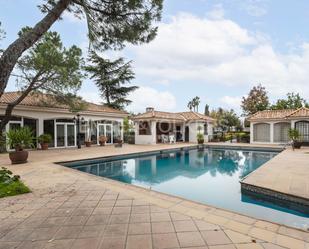 Vista exterior de Finca rústica en venda en Griñón amb Calefacció, Jardí privat i Piscina