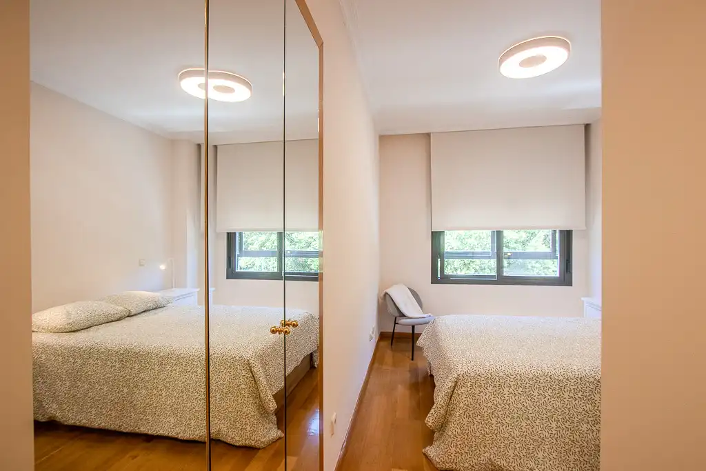 Bedroom of Flat for rent in Madrid  with Air Conditioner, Private garden and Storage room