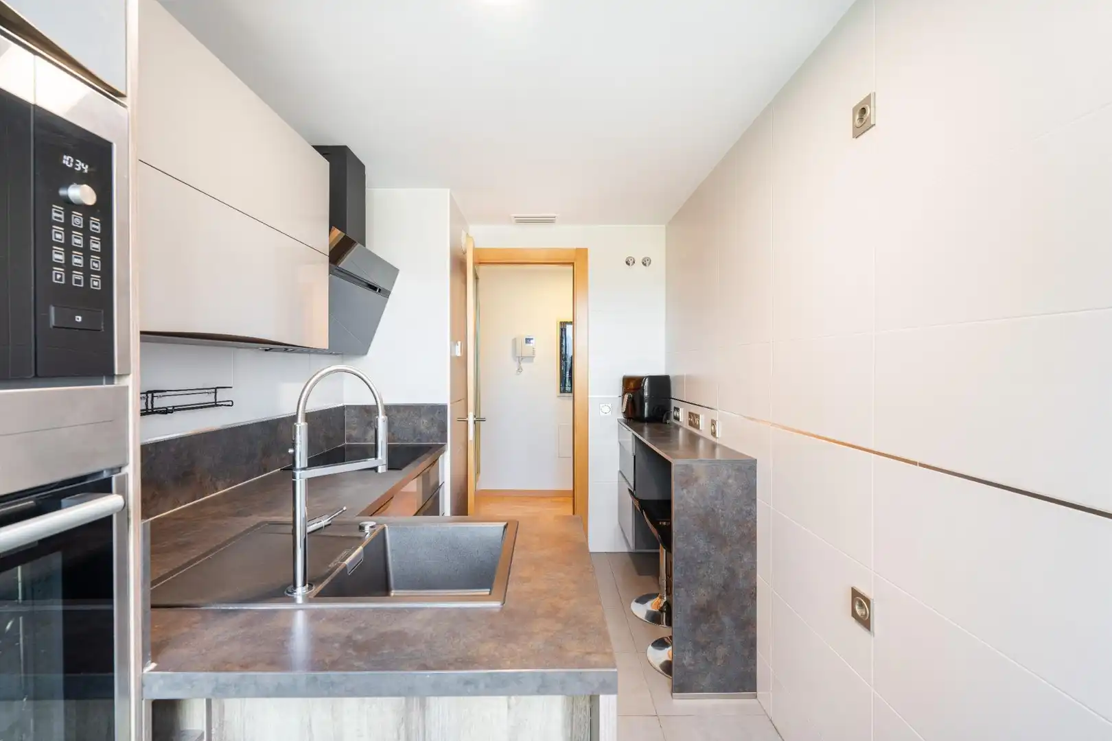Kitchen of Flat for sale in Almería  with Air Conditioner, Terrace and Storage room