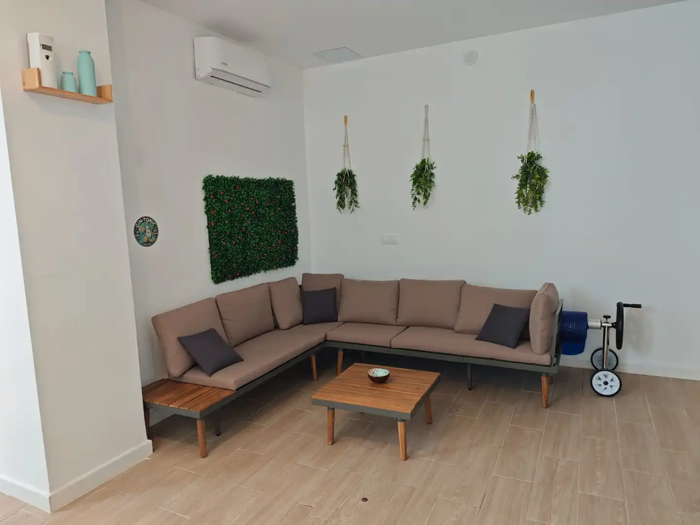 Sala d'estar de Casa adosada en venda en Cullera amb Aire condicionat, Piscina i Moblat