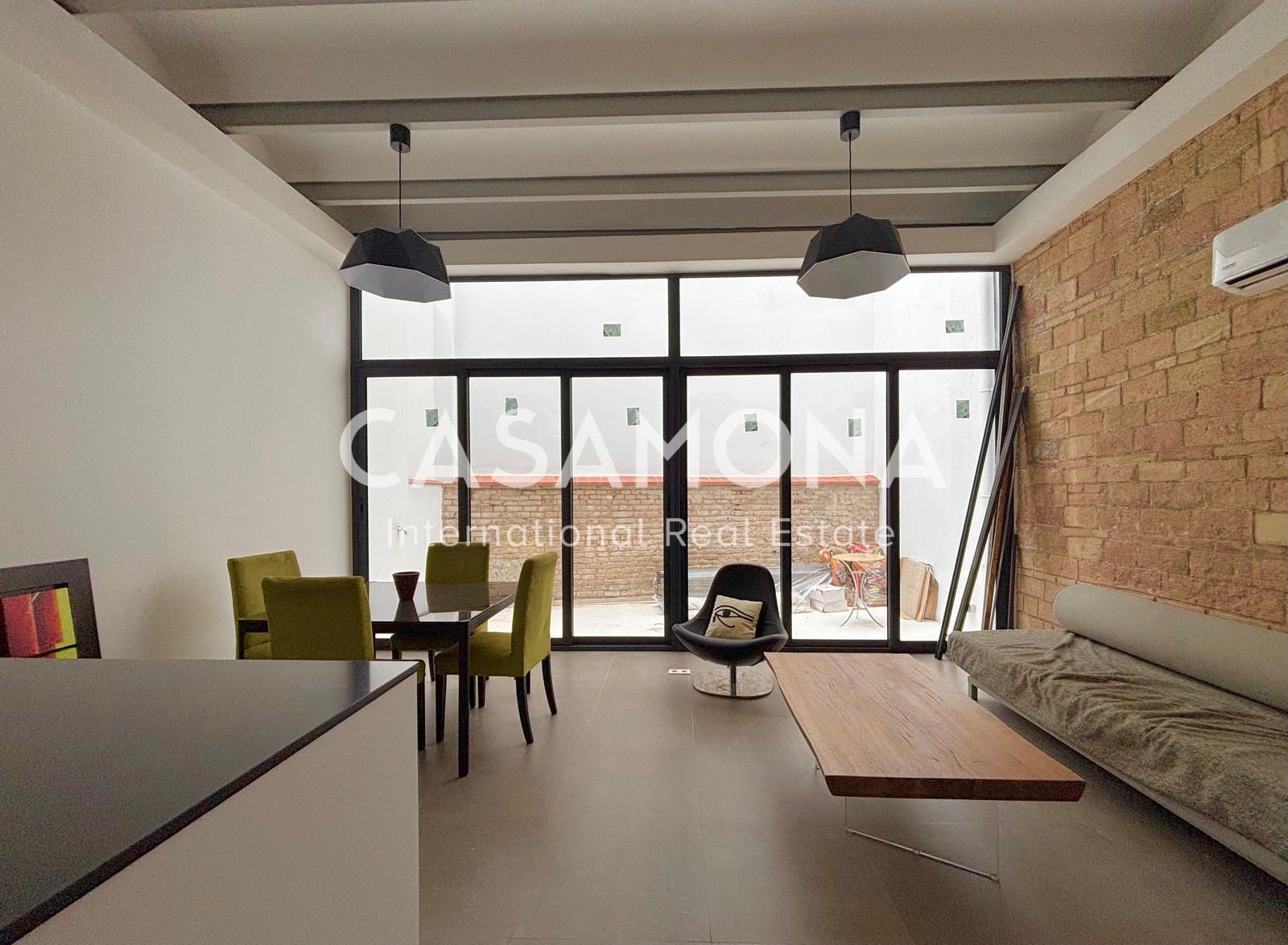 Sala d'estar de Dúplex de lloguer en  Barcelona Capital amb Aire condicionat, Calefacció i Terrassa