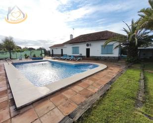 Exterior view of House or chalet for sale in Cartaya  with Air Conditioner, Private garden and Terrace