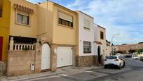 Exterior view of Single-family semi-detached for sale in Roquetas de Mar  with Parquet flooring, Terrace and Community pool