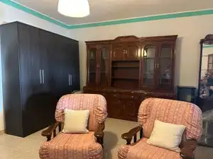 Sala d'estar de Casa adosada en venda en Mogán amb Jardí privat, Piscina i Moblat