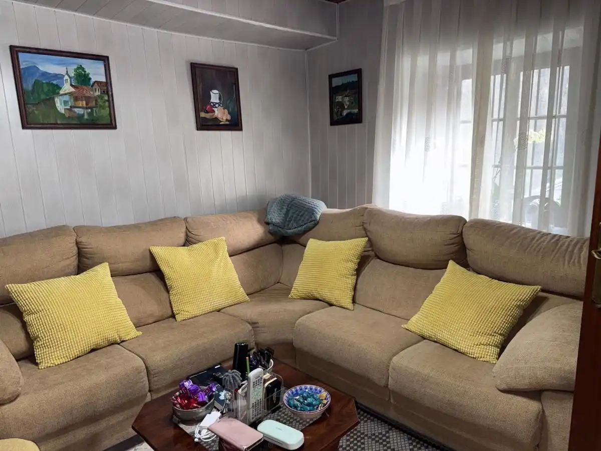 Sala d'estar de Casa adosada en venda en Posada - Barro