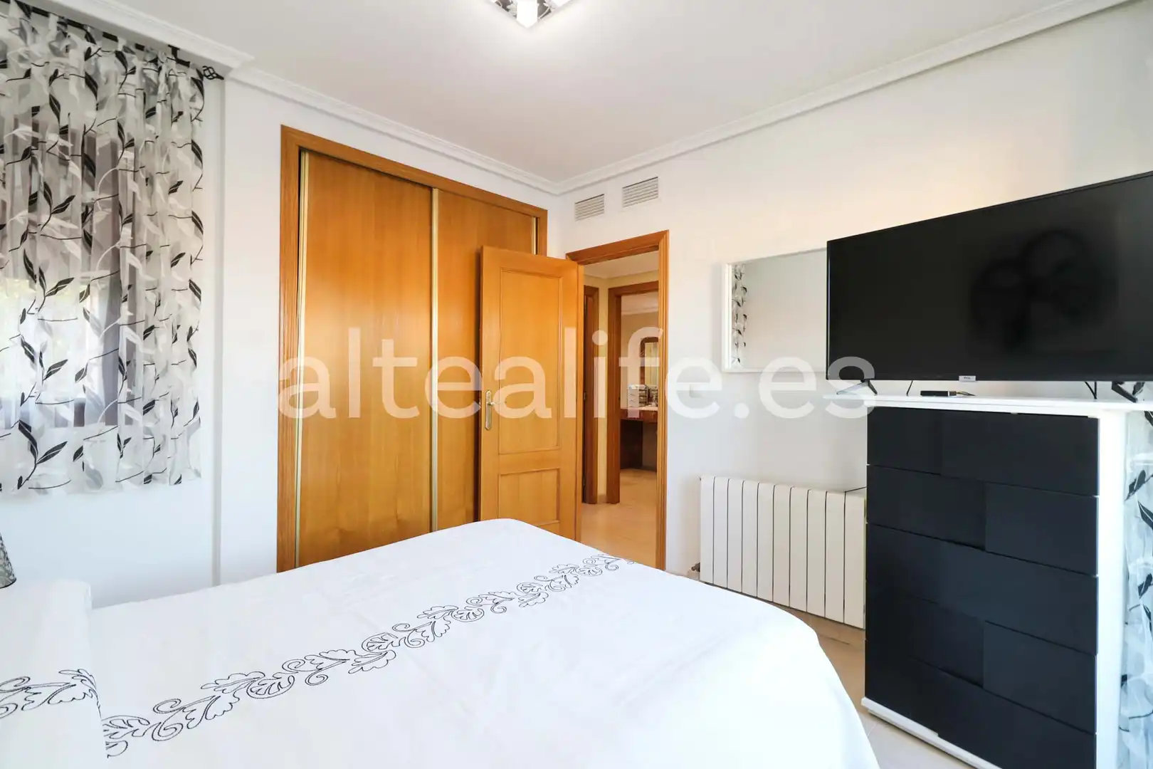 Habitación de Casa adosada en venta en La Nucia con Calefacción, Terraza y Piscina comunitaria