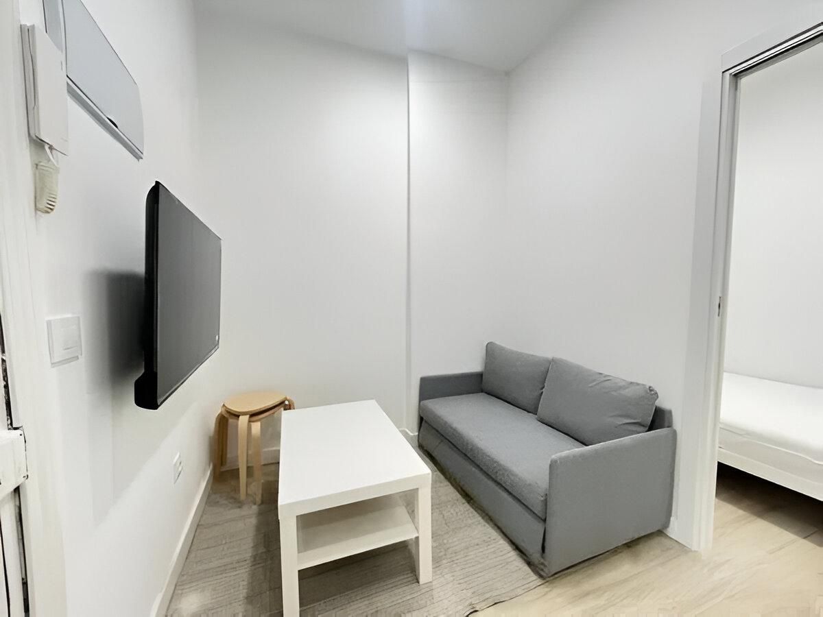 Sala d'estar de Planta baixa de lloguer en  Madrid Capital amb Calefacció i Moblat
