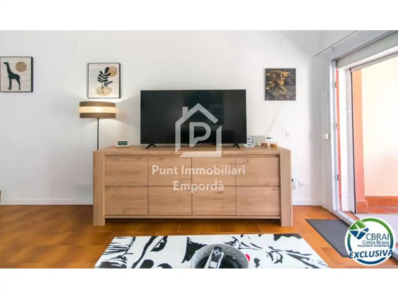 Sala d'estar de Apartament en venda en Empuriabrava amb Aire condicionat, Terrassa i Moblat
