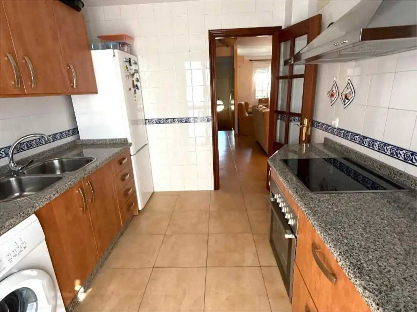 Cuina de Casa adosada en venda en El Pedroso amb Aire condicionat i Balcó