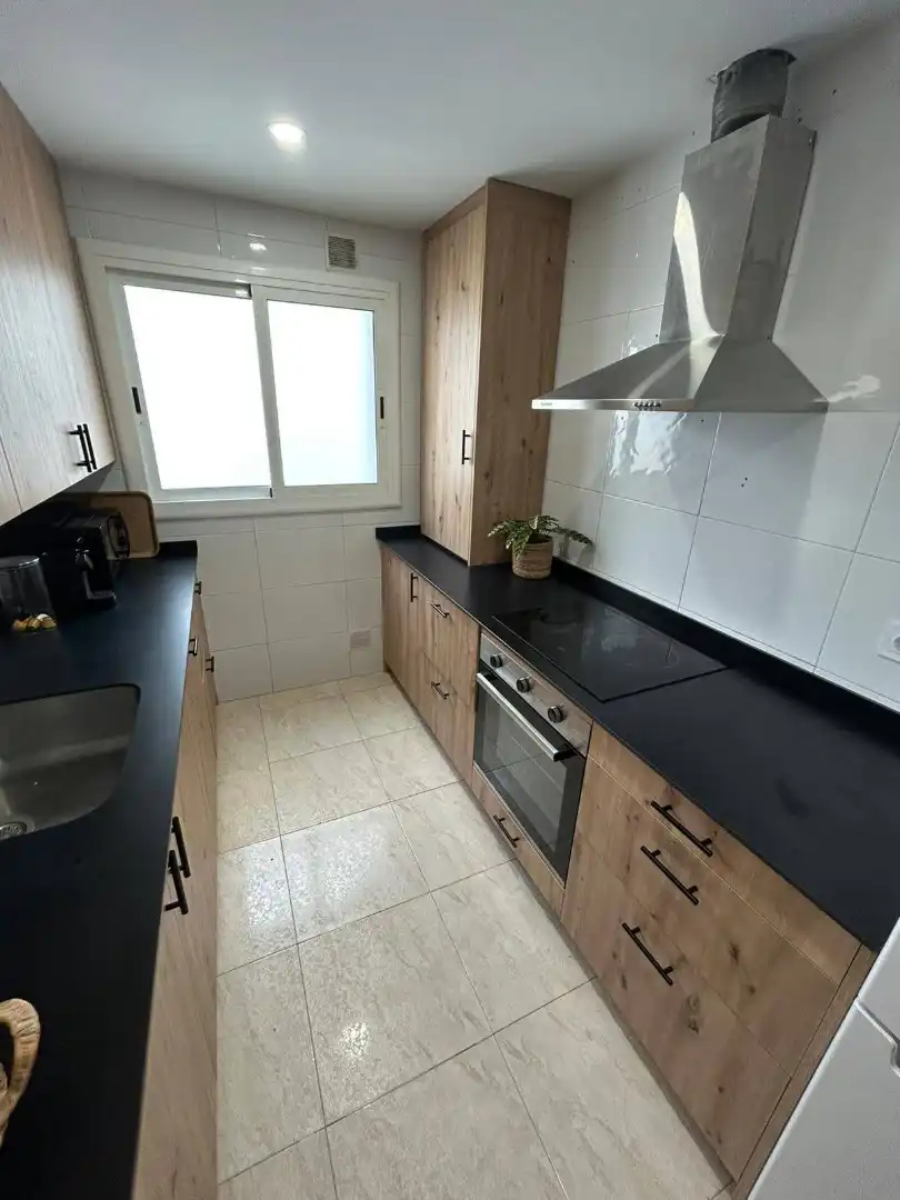 Kitchen of Flat for rent in Cunit  with Air Conditioner, Terrace and Furnished