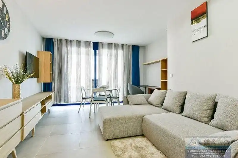 Sala de estar de Apartamento en venta en Torrevieja con Aire acondicionado, Terraza y Piscina