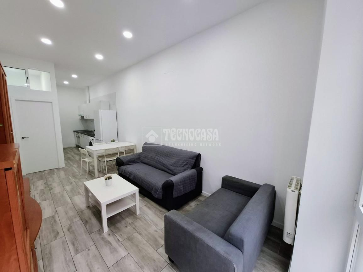 Sala de estar de Piso en venta en  Madrid Capital