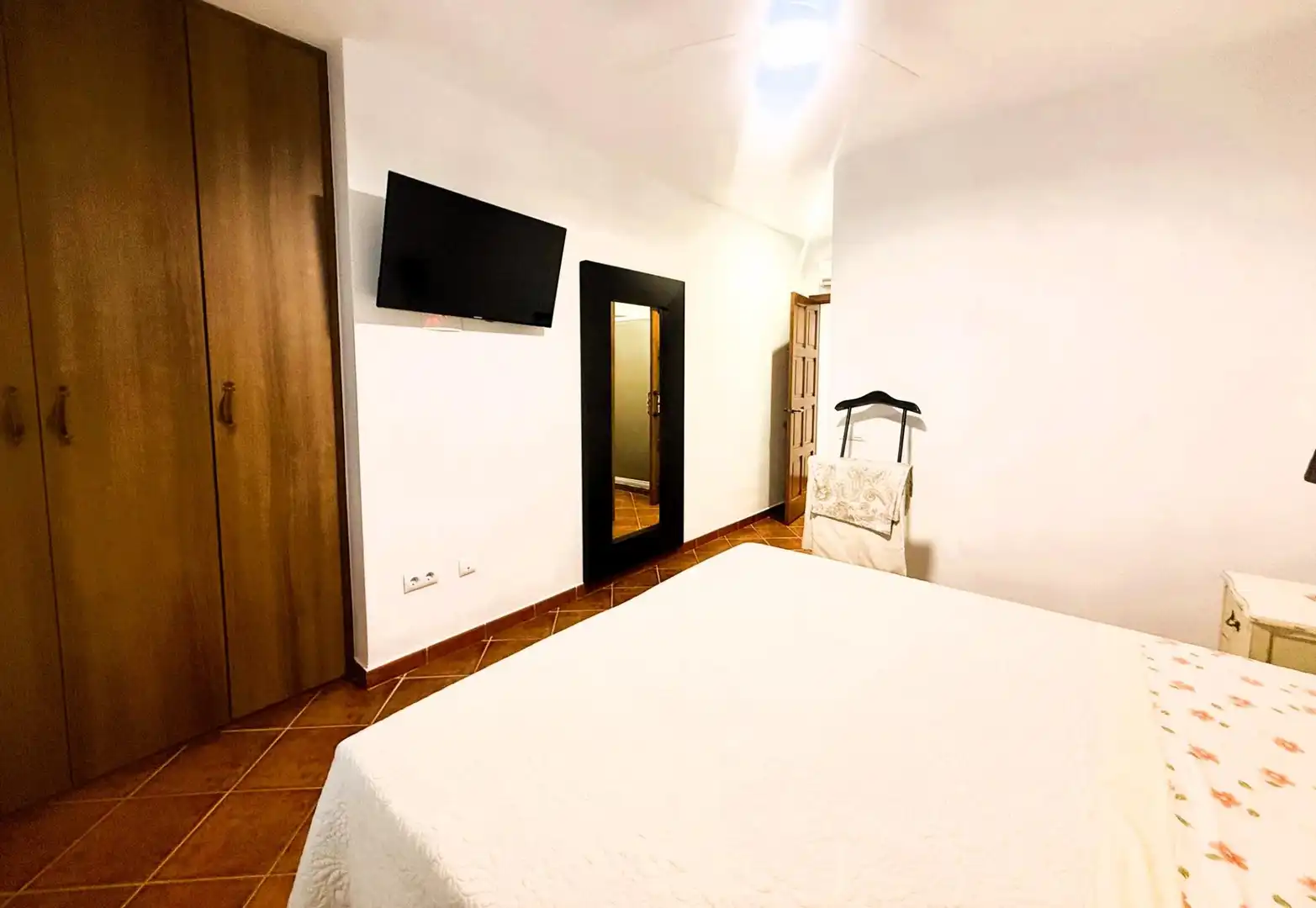 Dormitori de Casa o xalet en venda en La Rinconada amb Aire condicionat, Jardí privat i Piscina
