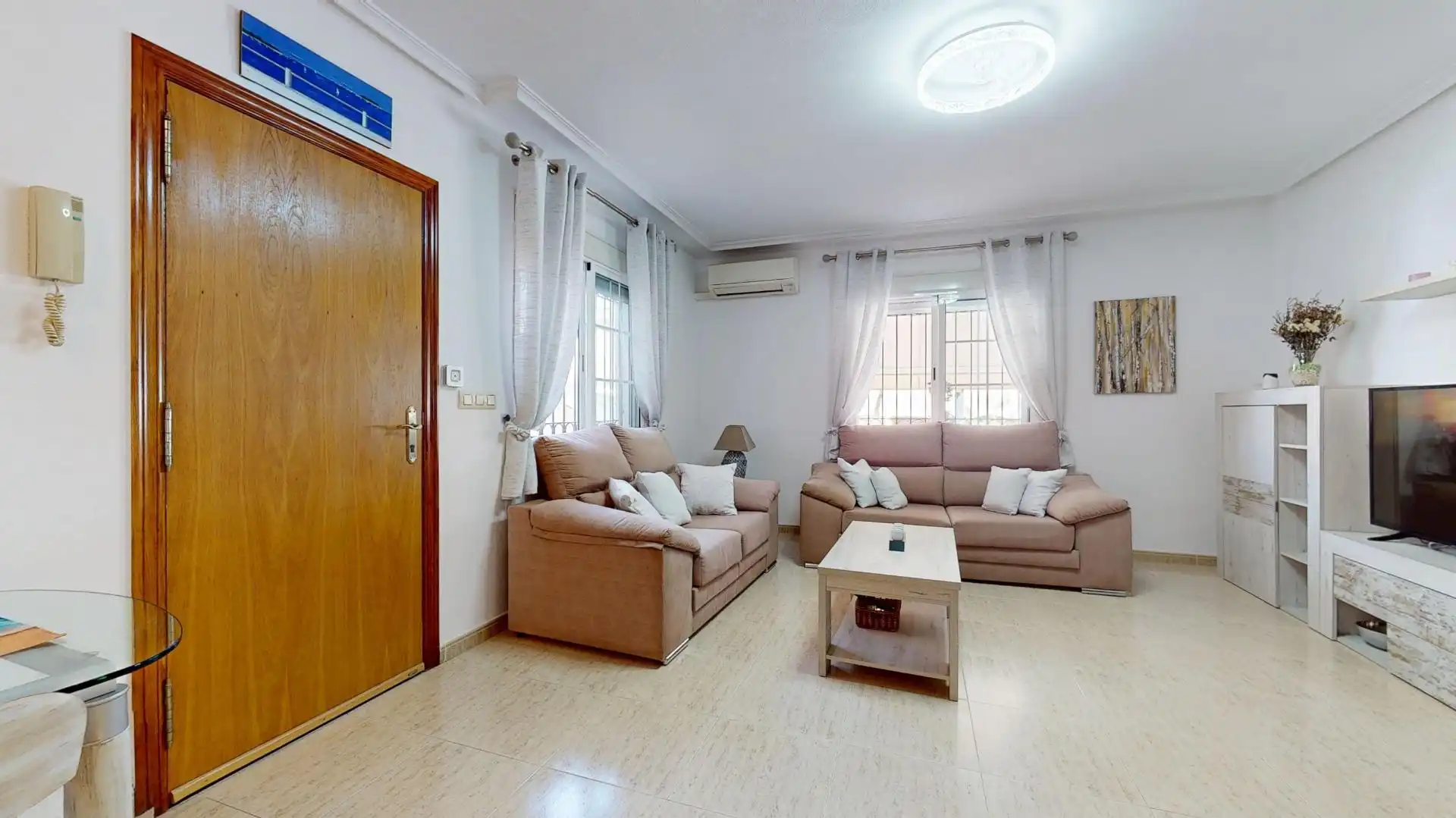 Sala de estar de Casa adosada en venta en San Pedro del Pinatar con Aire acondicionado, Terraza y Trastero