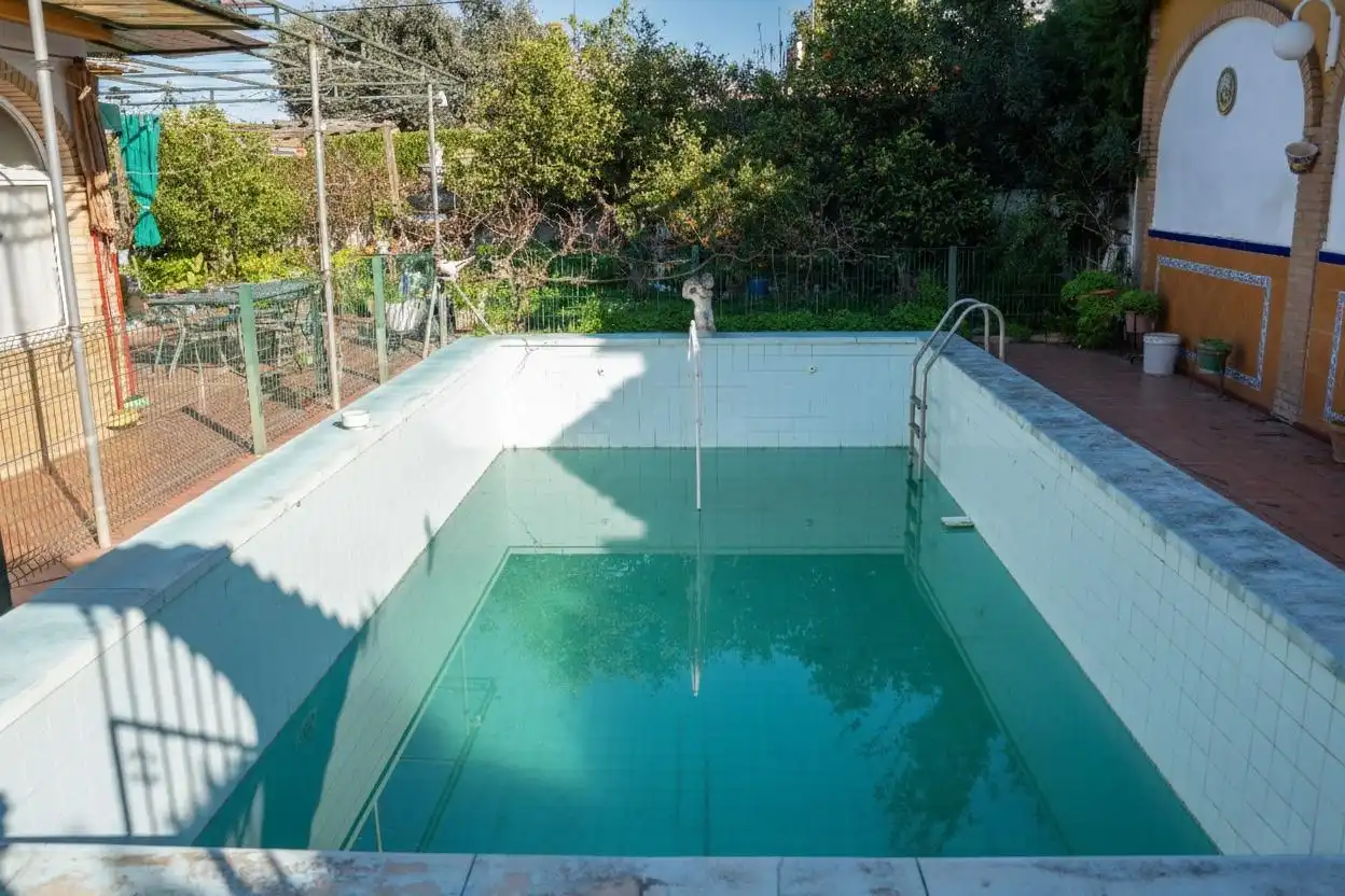 Swimming pool of Houses for sale in Gines  with Air Conditioner, Heating and Private garden