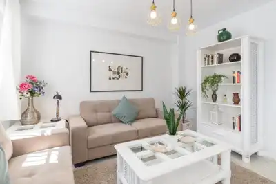 Sala de estar de Casa adosada en venta en Benalmádena con Aire acondicionado, Calefacción y Jardín privado