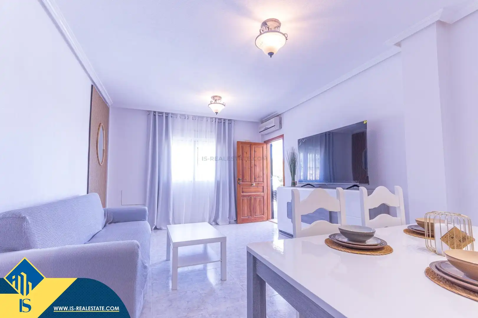Sala d'estar de Casa o xalet en venda en Orihuela amb Aire condicionat, Terrassa i Moblat