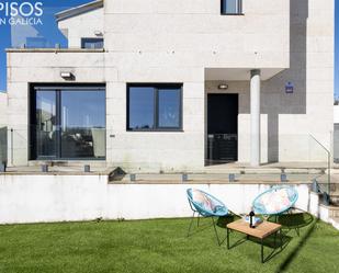 Terrassa de Casa adosada en venda en Sanxenxo amb Jardí privat